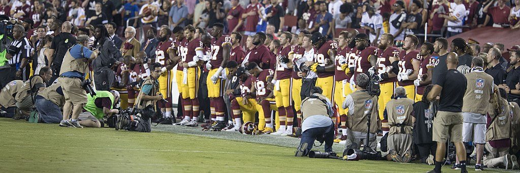 NFL Washington Redskins players kneel during national anthem