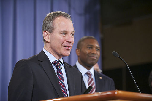 Eric Schneiderman and Tony West at press conference.