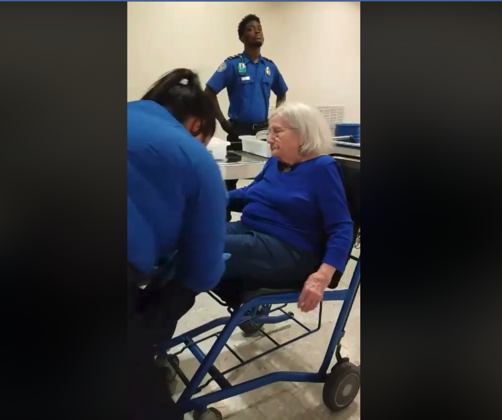 Screenshot of Evelyn LaBrier being patted down by TSA agents.